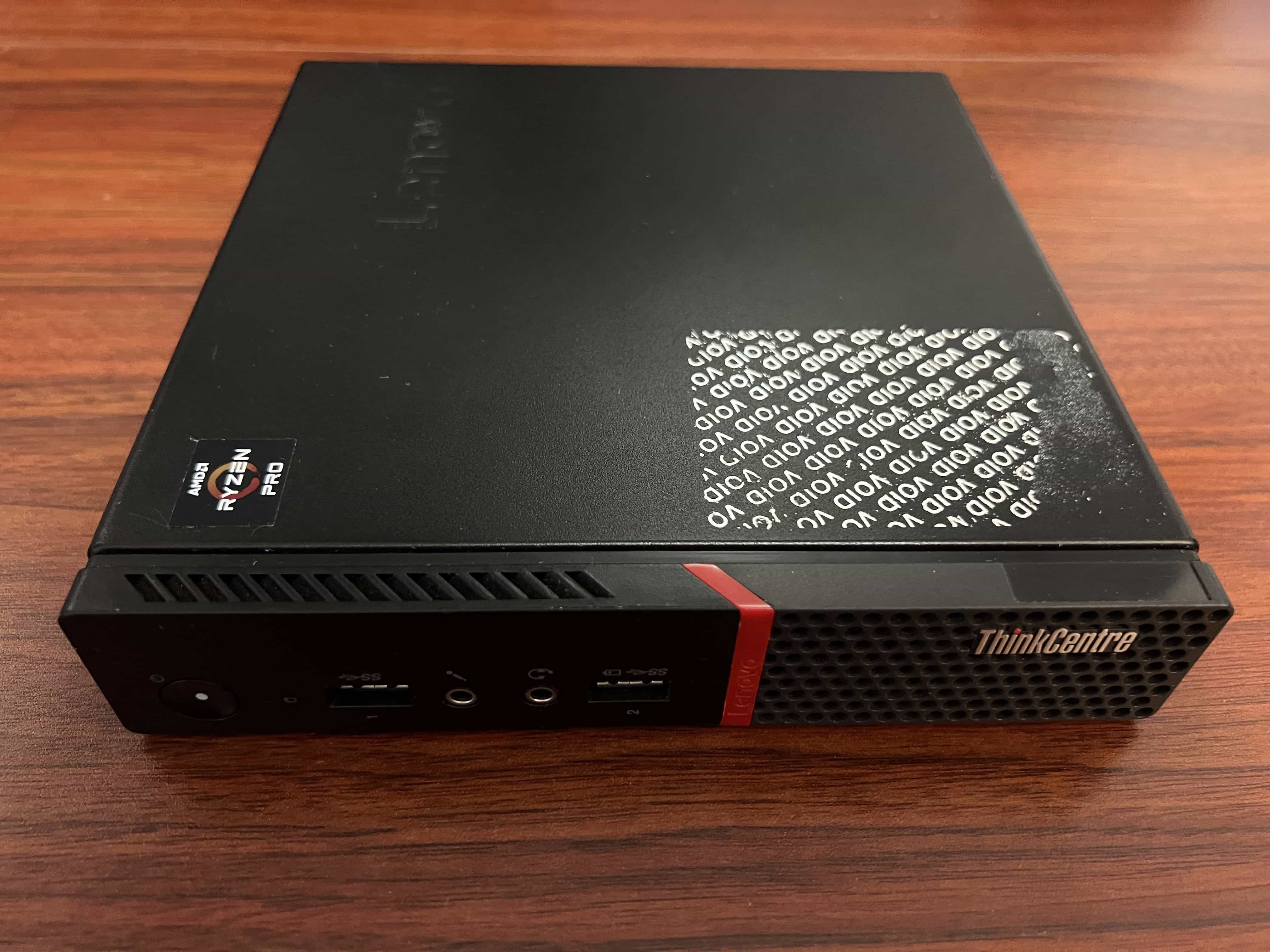 Front view of the closed Lenovo ThinkCentre M715q before modification
